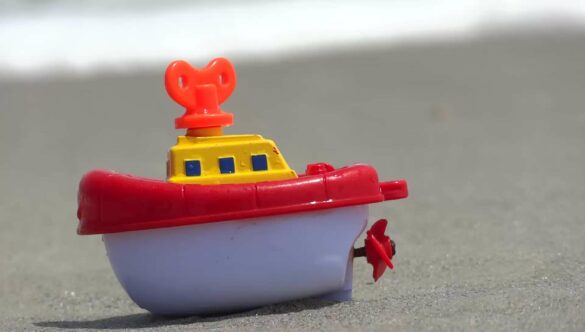 Toy Boat on Beach