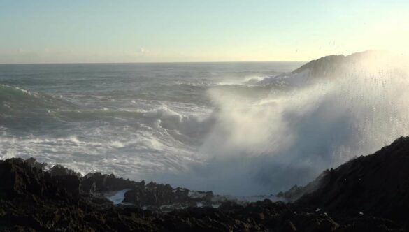 Waves Breaking Crashing on Rocks